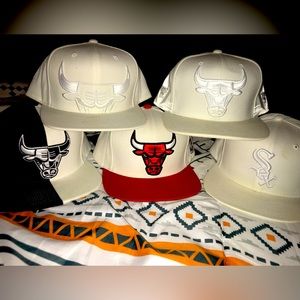 Lot of 5 SnapBack hats. All Chicago Bulls besides 1 chicago white sox.Ships fast